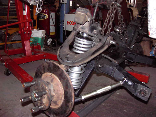 The front suspenion mounts to the engine cradle / front subframe.