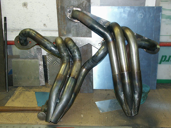 custom headers pieced together from pre-bent tubing sections