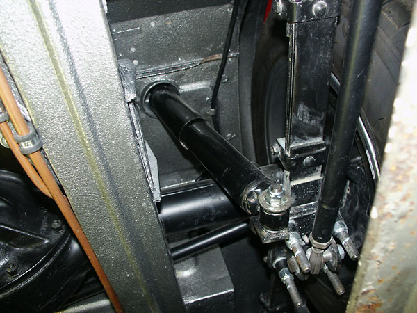 Panhard rods restrict side-to-side movement of the body when cornering.