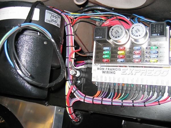 Ron Francis wiring harness featuring two relays, two flashers, and sixteen fuses.