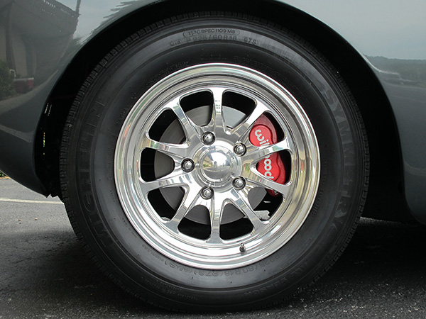 Intro custom aluminum wheels (front 16x7, rear 16x8).