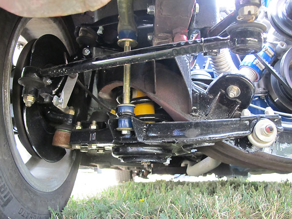 Original mounting brackets for the four cylinder engine may be seen.