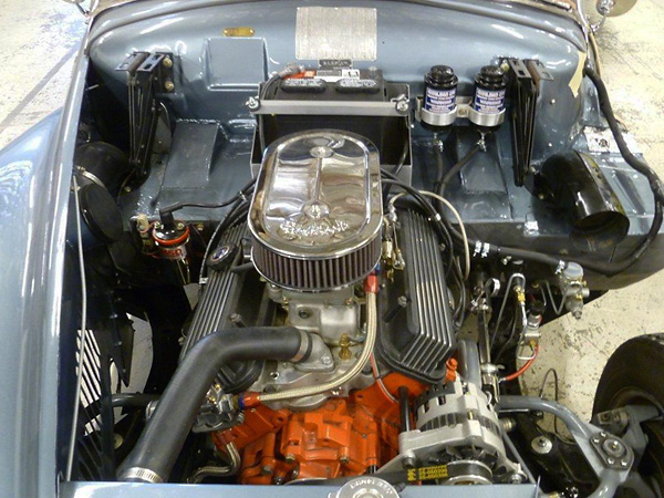 Chevy 3.4L V6 crate motor with Edelbrock Performer intake manifold and Holley 390 carburetor.