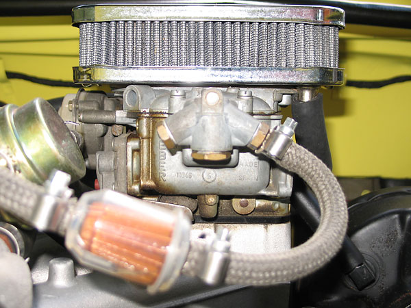 Weber 32/26 DGEV carburetor mounted to a stock BMW 2002 intake manifold.