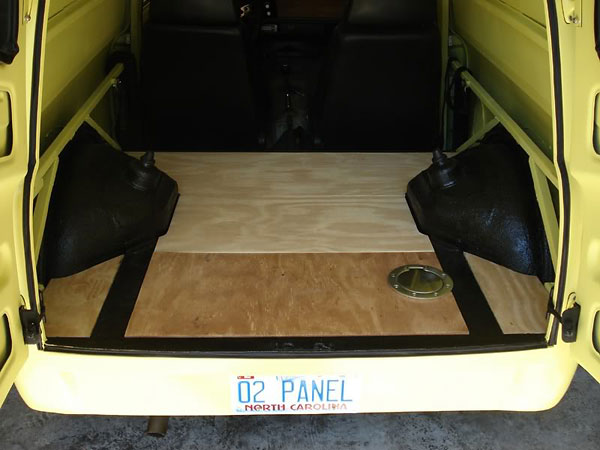 Plywood cargo floor. Note flush fuel filler, which will be hidden under carpet.