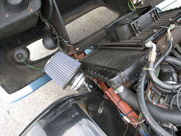 The fuel injection system uses a Bosch L-Jetronic flapper valve airflow sensor.