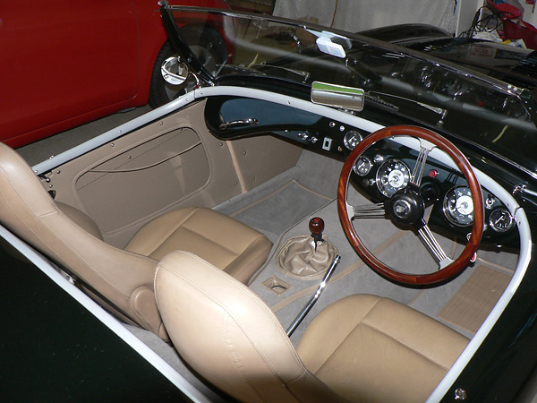 Bob Whittred made this custom wood steering wheel. Mazda MX5 (Miata) seats.