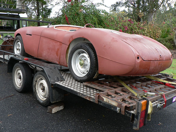 Custom fabricated steel wheels comprised of Healey 100/6 wheel centres and Chrysler 5.5 inch rims.