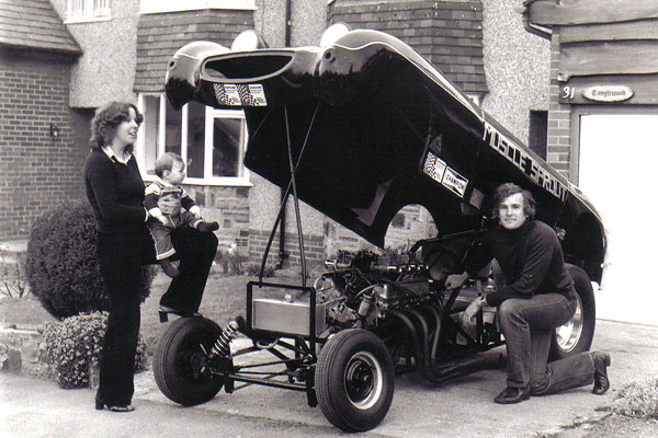 Rover V8 with Weber DCOE side-draft carburetors.