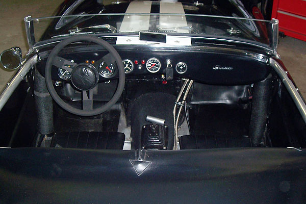 The cowl hoop from the old roll cage is hidden behind the instrument panel.