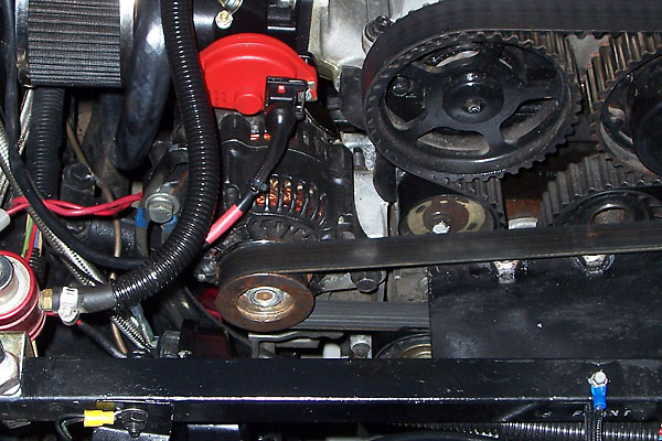 High output one-wire mini alternator mounted on custom brackets.