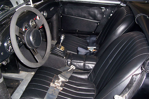 Cobra bucket seats with Simpson competition seat belts.