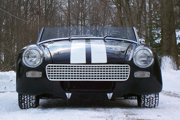 Fiberglass hood, front fenders and valance (with enlarged air inlet and filled bumper holes.)