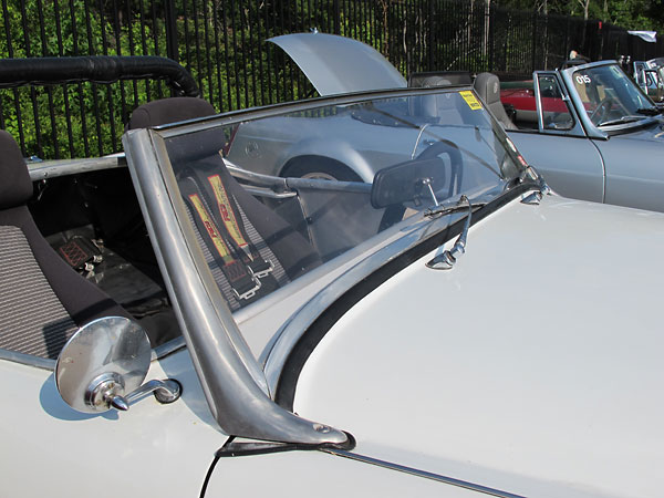 This particular Austin Healey 3000 MkI windscreen has been rakishly chopped.