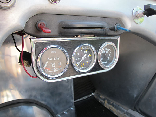 Smiths voltmeter, Sunpro vacuum gauge, and Sunpro water temperature gauge.