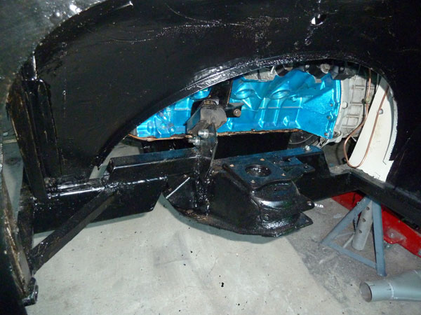 MGB front suspension crossmember welded into place in a Morris Minor.