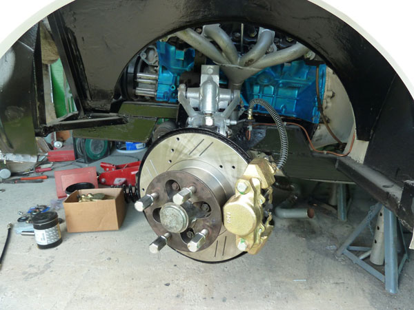 MGB front brakes, slightly upgraded with drilled and slotted rotors.