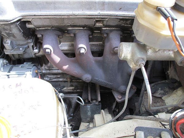 Stock 1974 Alfa Romeo cast iron exhaust manifold.