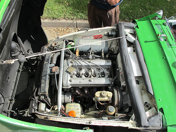 A clothesline reel is used to limit travel of the front clip.