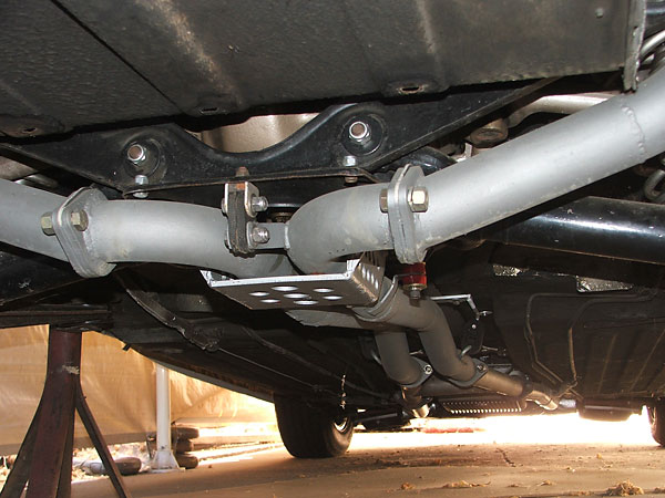 2.5 inch exhaust system with mandrel bends and a crossover pipe.