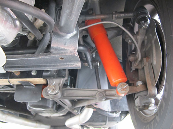 (Torsion springs are difficult to see or photograph with the car on the ground.)