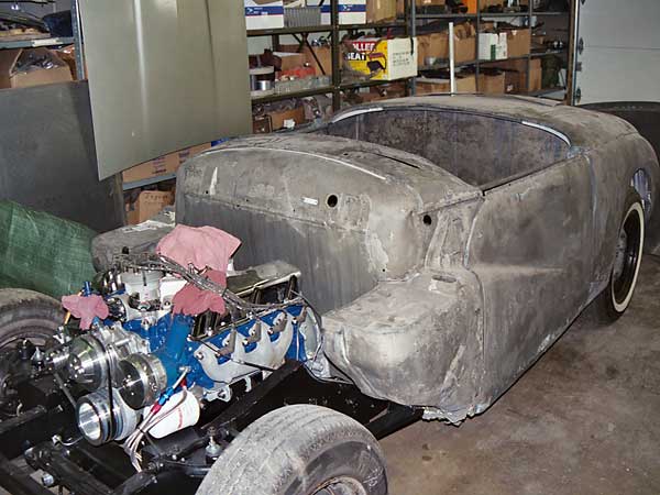 The chemically-stripped 1954 Alpine body is reunited with the frame.
