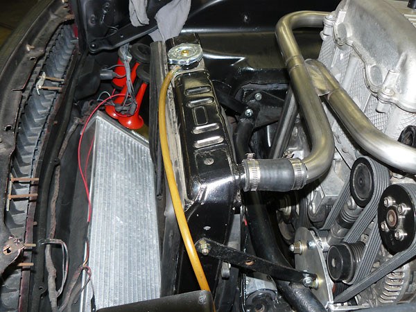 Relationship of the supercharger heat exchanger to the radiator.