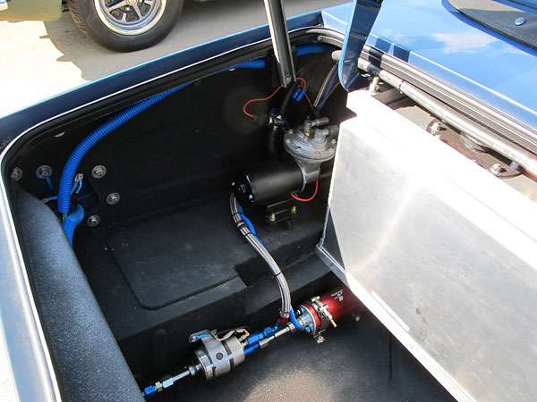 Left: Corvette fuel filter and regulator (1999-2004). Right: Aeromotive inline fuel pump.