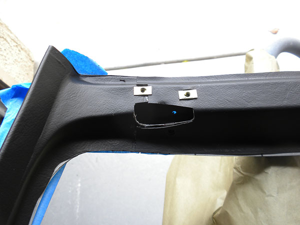 The inboard surfaces of the TR6 windshield surround are covered with pre-formed vinyl.