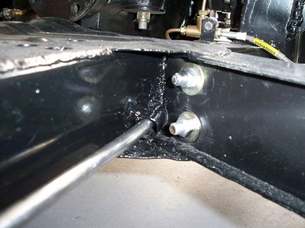 Steel tubes were welded into the frame for routing fuel and brake lines.