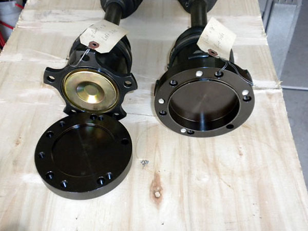 These CV joints have 5-bolt flanges, so Calvin needed to use adapters to mate to his 6-bolt Nissan rear end.