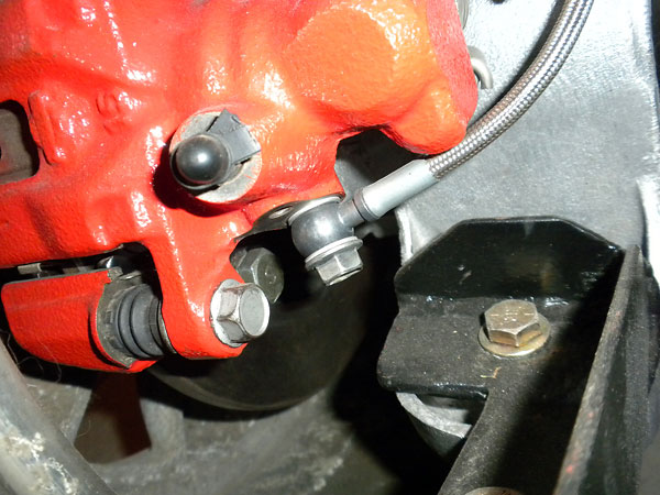 The bleeder screw on the caliper isn't ideally positioned.