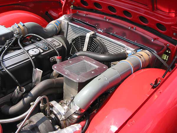 boost! Note the strap that helps keep the intercooler pipe from blowing off.