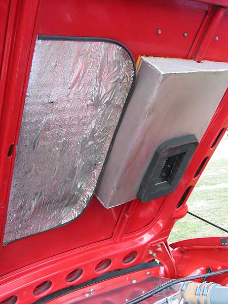 Hood scoop feeds into a plenum integral to the hood, which houses a panel air filter.