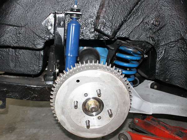Alfin (aluminum finned) brake drums are mounted on Good Parts hubs with 3/8 inch studs.
