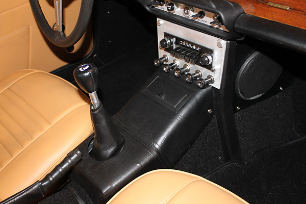 A leatherette covered aluminum box accommodates the 6 inches rearward placement of the T5 transmission.