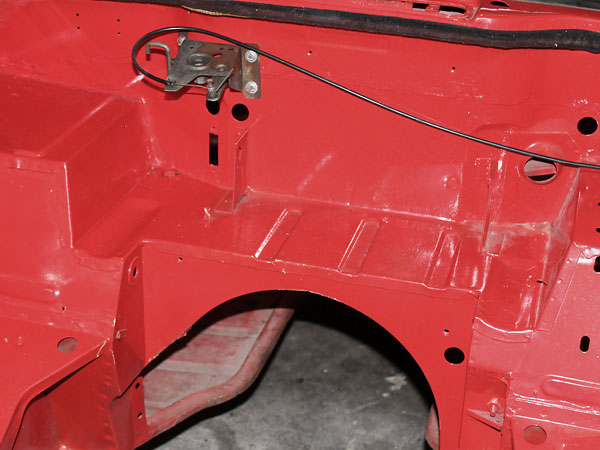 Original battery tray and transmission tunnel of the stock TR-6.