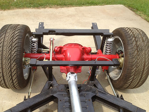 Owner built adjustable 3-link rear suspension, with adjustable coilover shock absorbers.