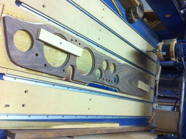 Here's the custom walnut dashboard, being cut out!