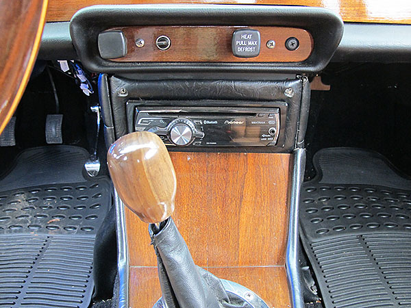 Custom walnut shift knob and center console. Pioneer DEH8400 stereo head unit.
