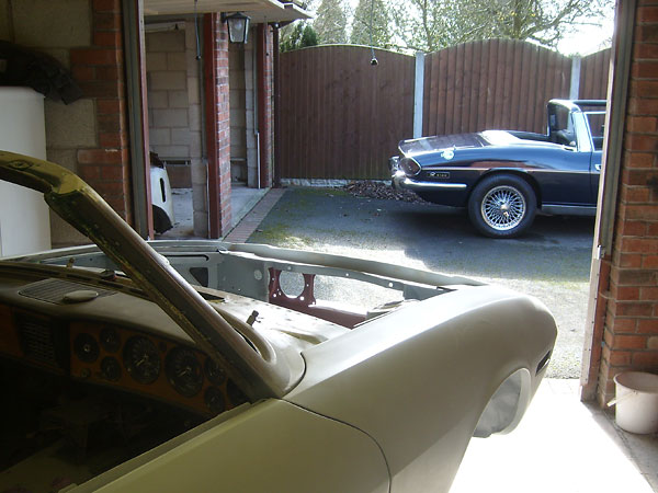 New front fenders on a Triumph Stag.