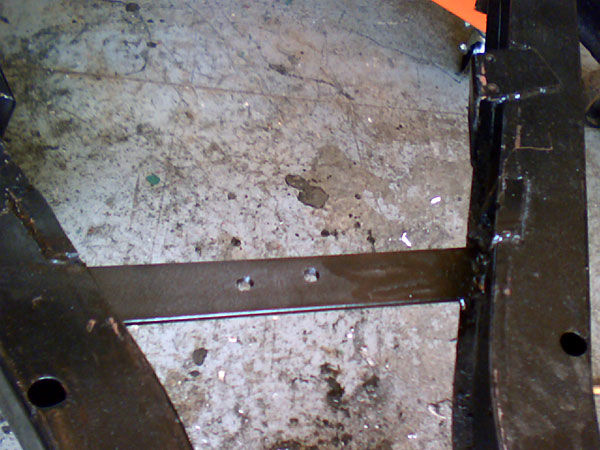 Transmission support bracket, added between the frame rails.