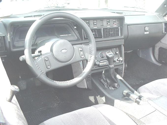 TR7 dashboard with Ford steering wheel and instruments