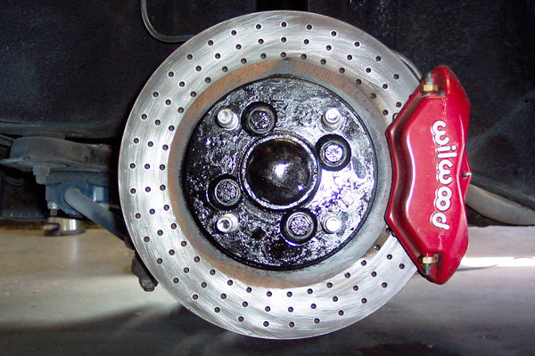 Wilwood 4-piston calipers and 11 inch vented rotors.