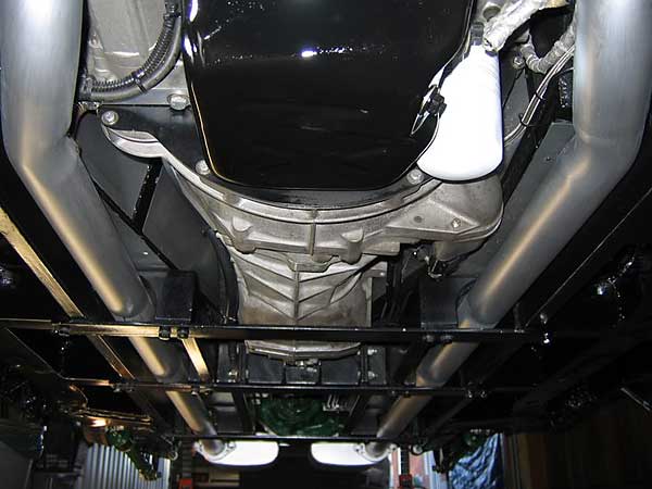Through-the-frame exhaust, with heat shields.