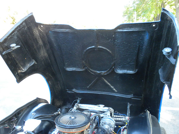 Instead of installing fenders and hood the conventional way, I created a one piece front clip,