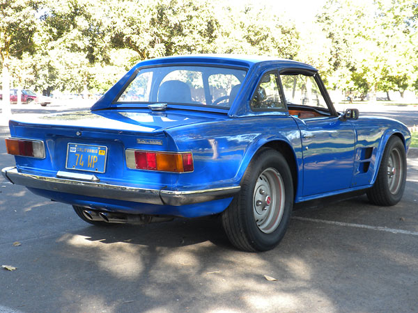 Chrome trim has been removed from this Triumph TR6 factory hardtop.