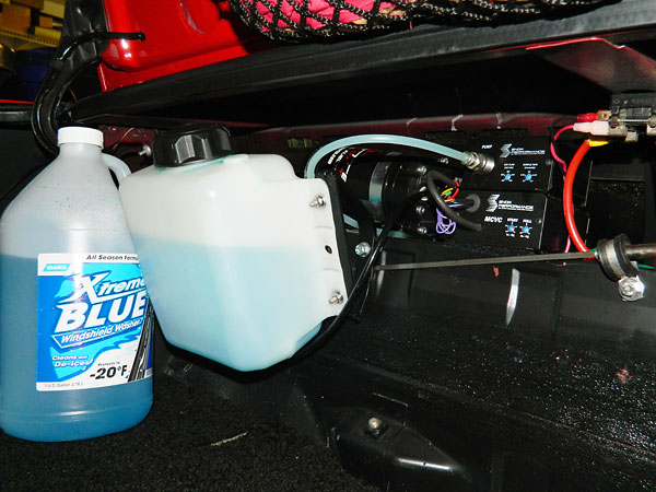 Snow water/methanol injection system uses windshield wiper fluid.