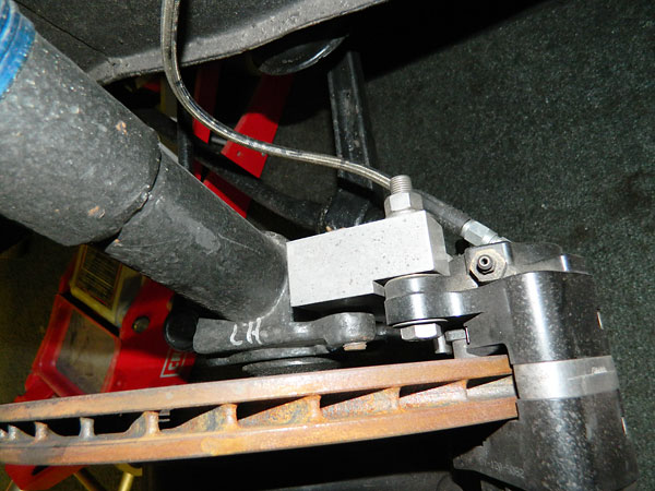 Caliper adapter mounting brackets.