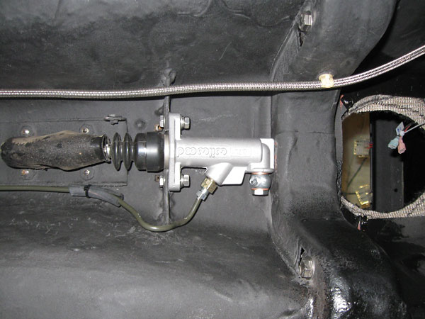 Wilwood flow-through parking brake master cylinder.